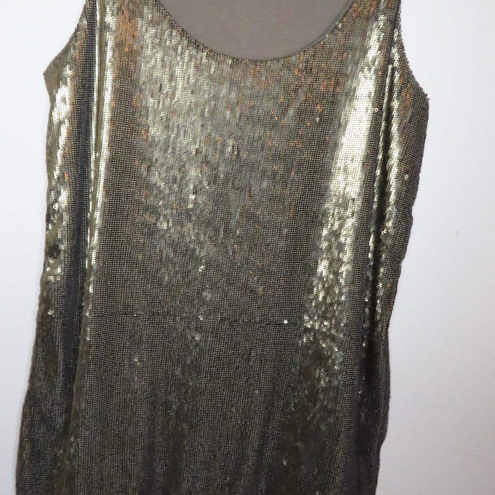 Stunning top with dazzling appeal.